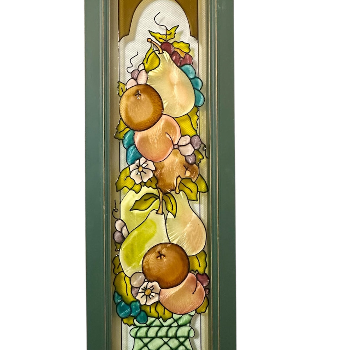 Stained glass panel featuring a colorful arrangement of fruits, including pears and oranges, complemented by floral elements and decorative accents.