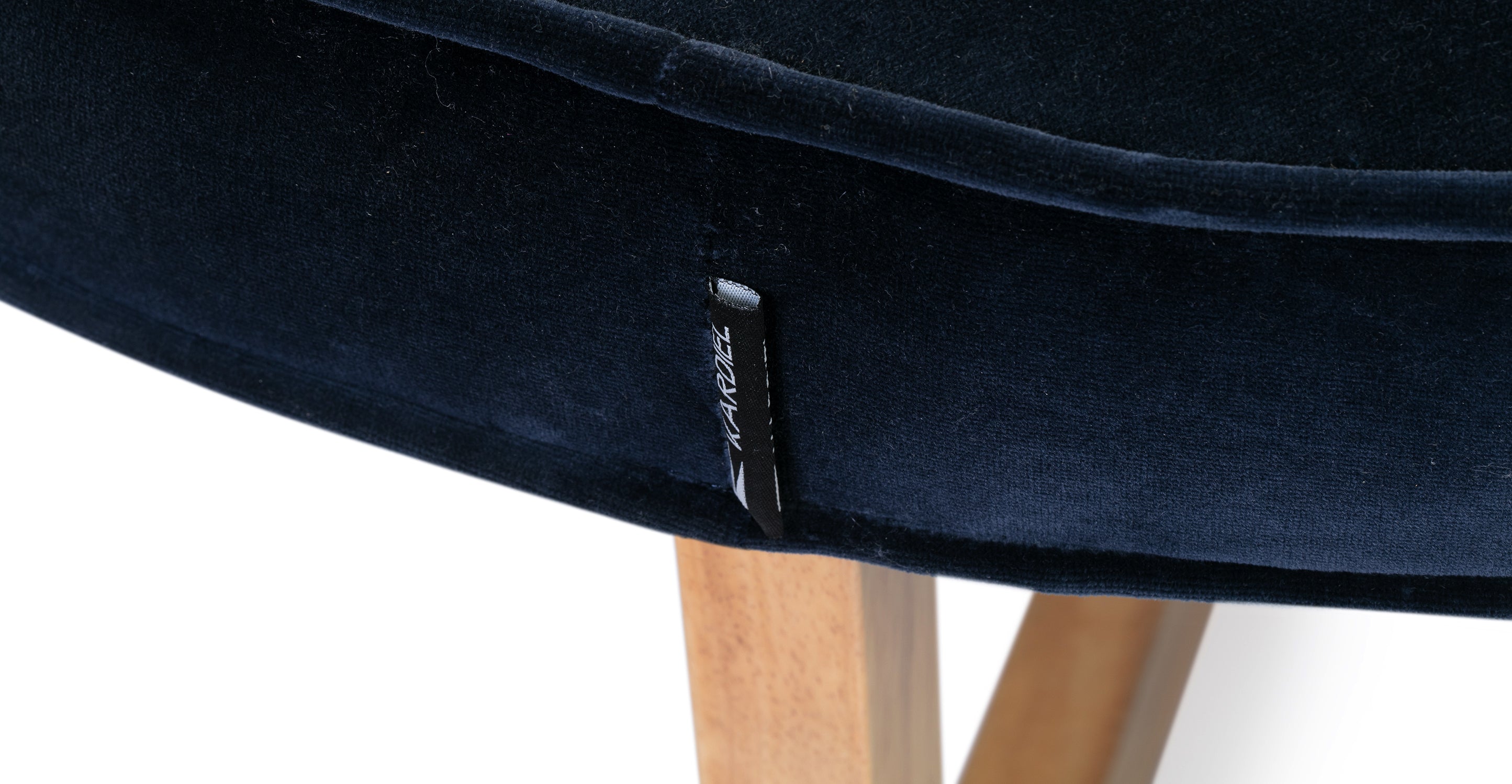 Zoom in on Compass ottoman showing the Kardiel tag.