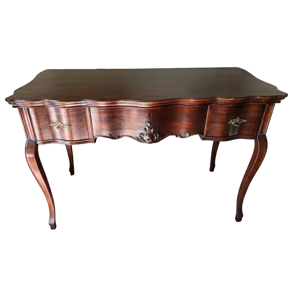 Wooden desk with curved design and decorative elements on a white background