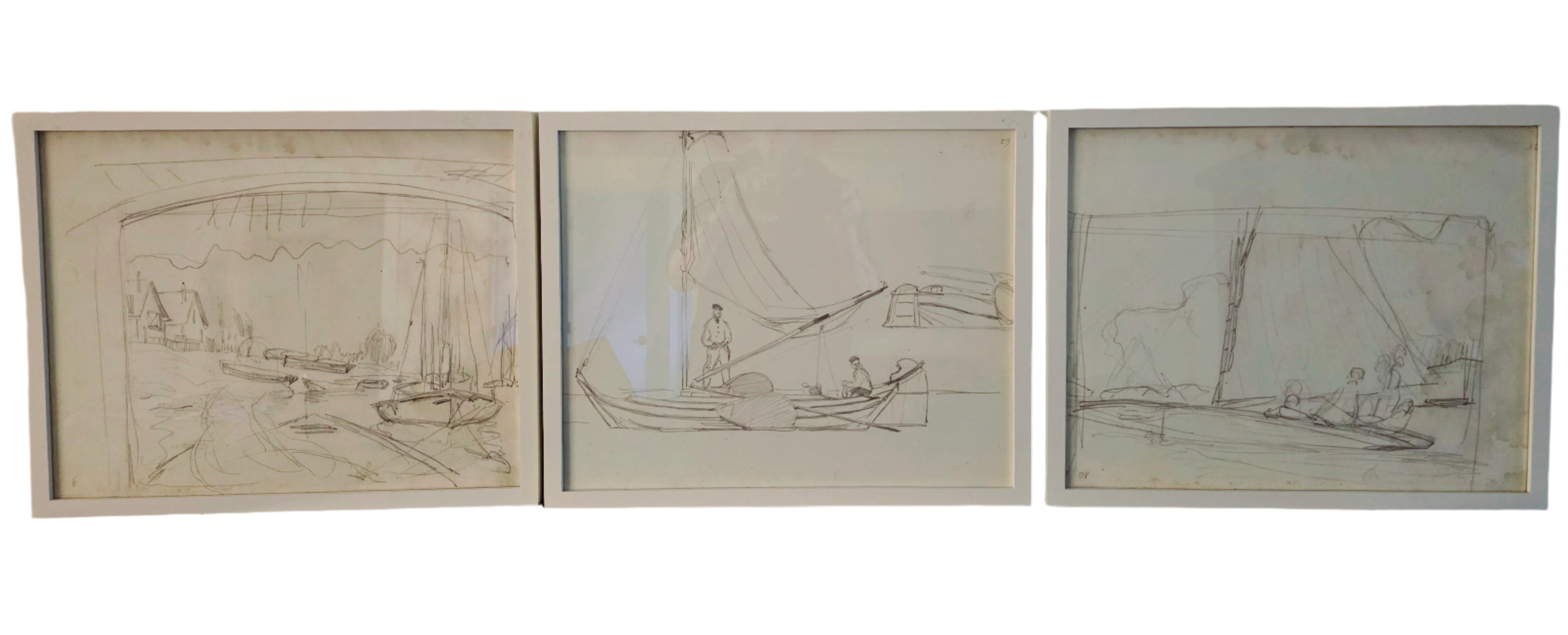 Three framed sketches of boats and figures, showcasing simple lines and a nautical theme, displayed against a neutral wall.