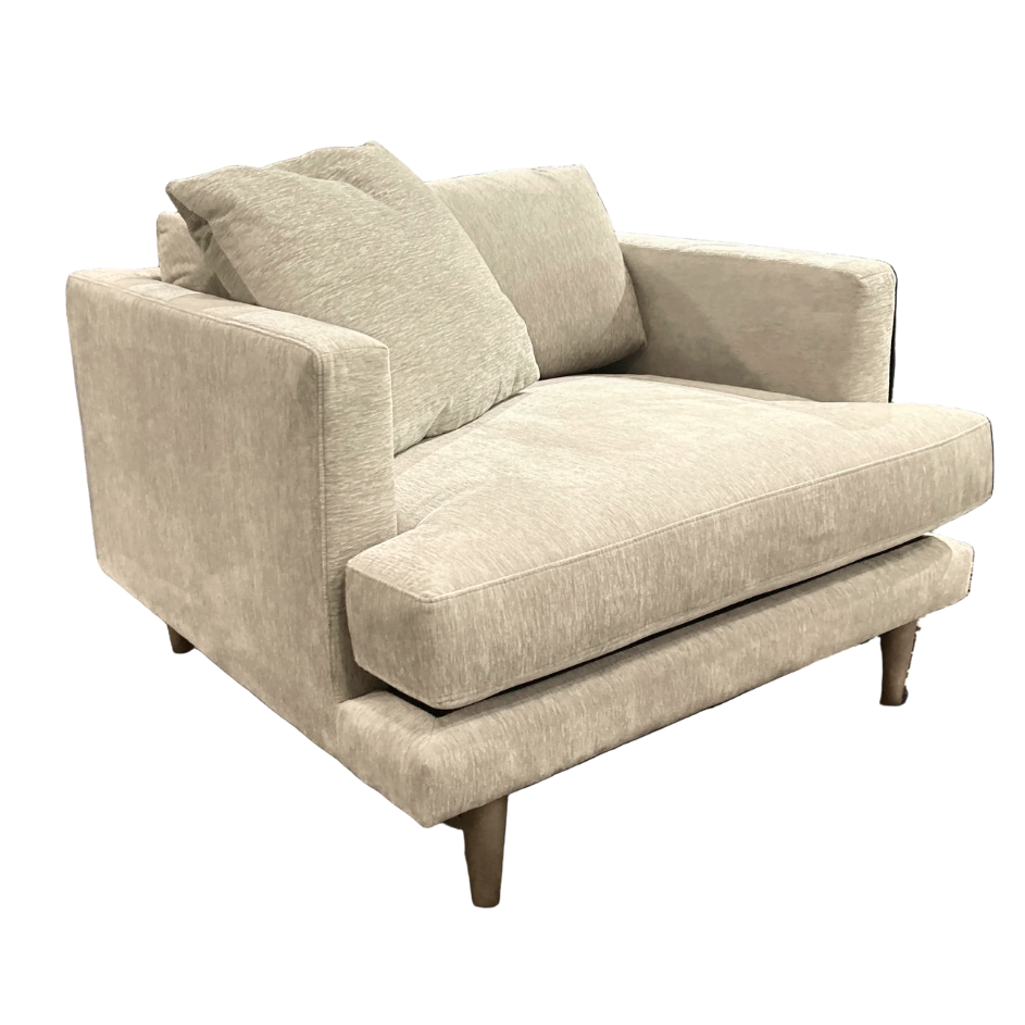 A modern two-seater armchair upholstered in a textured light beige fabric, featuring two matching back cushions and tapered dark wood legs, shown against a plain white background.