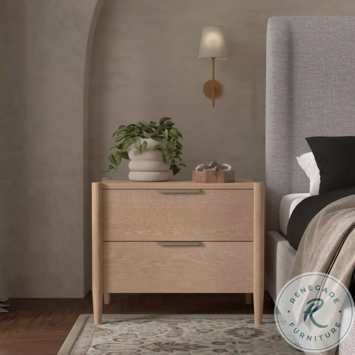 Sinclair nightstand styled beside a bed