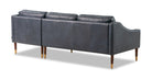 Brando is a modern sectional in blue leather. The chaise of the sectional, when you are facing the sectional, is on the right and the sofa portion is on the left. Walnut stained legs with gold tips toward the floor. The sofa fully upholstered and has swooping arms that taper from the back, down to the front. Both back and seat cushions are removable. The back cushion is smooth, the seat cushion is tufted. (facing back)