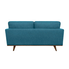 A rear view of the blue mid-century modern sofa, displaying the smooth backrest and the wooden legs, maintaining the clean lines of the design.