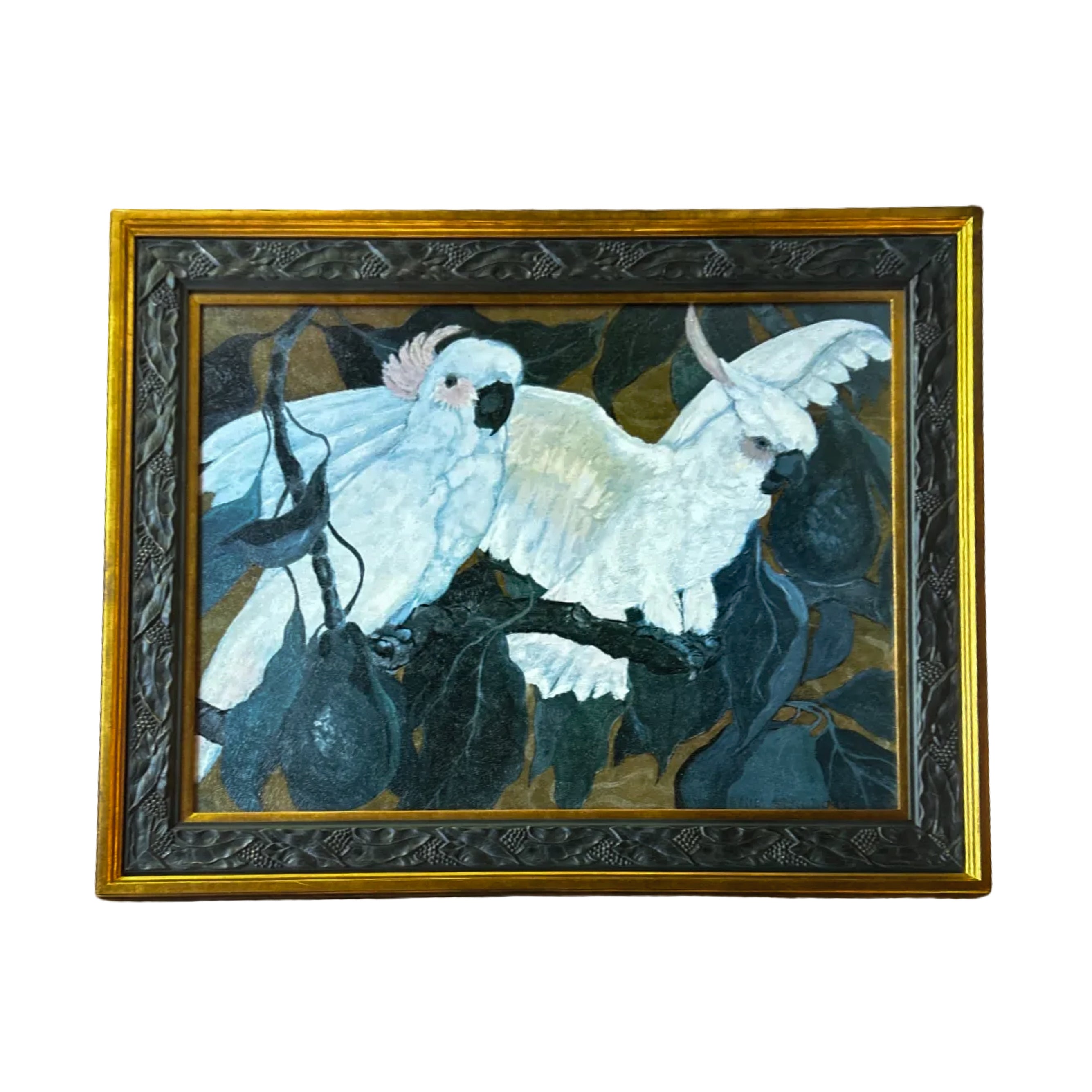 A framed mosaic artwork depicting two white cockatoos perched on a branch with dark foliage and hanging fruit, set in an ornate gold and black frame against a plain white background.