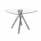 Glass dining table with metal base on a white background