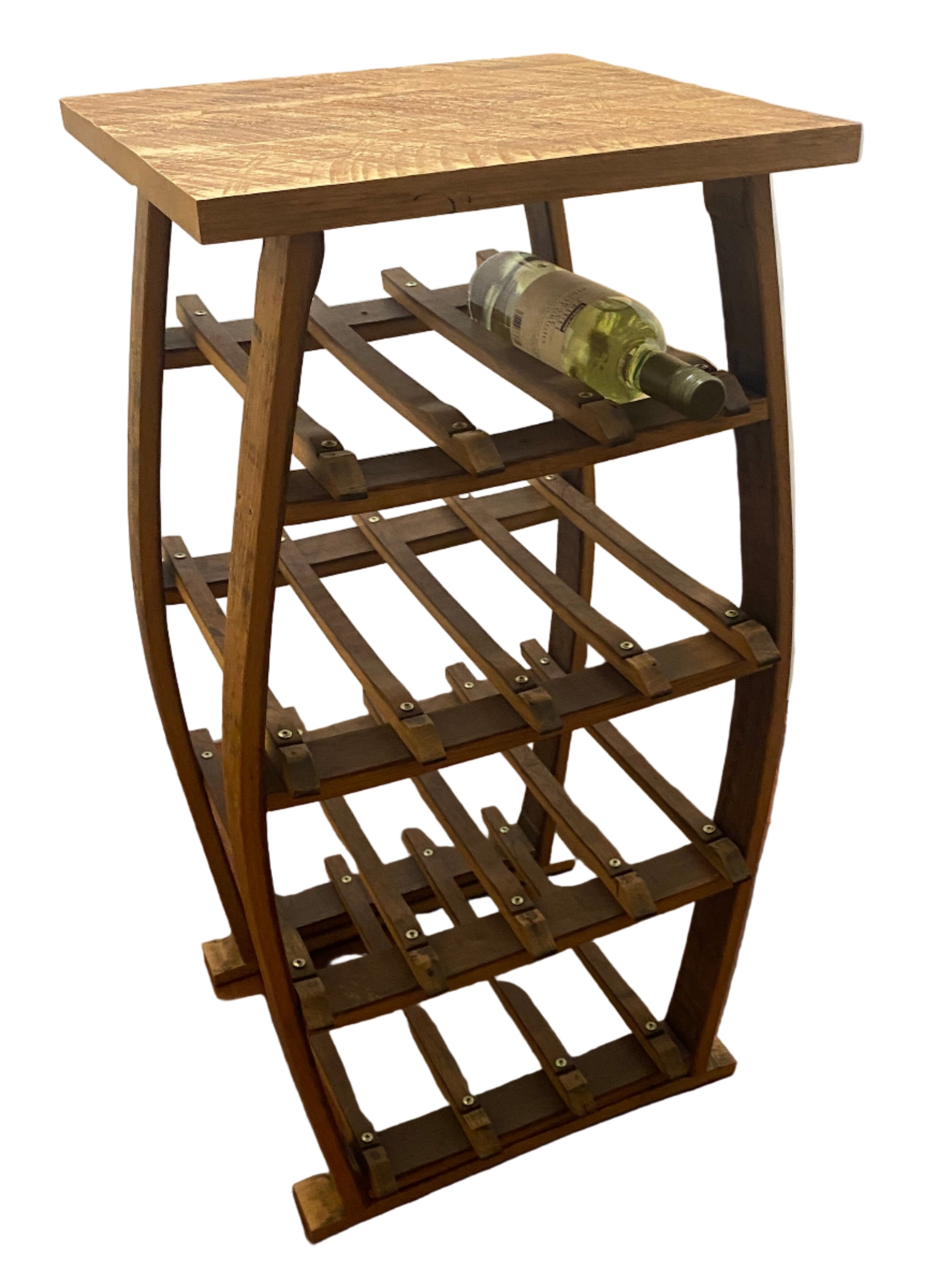 A wooden wine rack with a smooth top and several horizontal slats holds a wine bottle. It's positioned on a wooden floor near white doors.