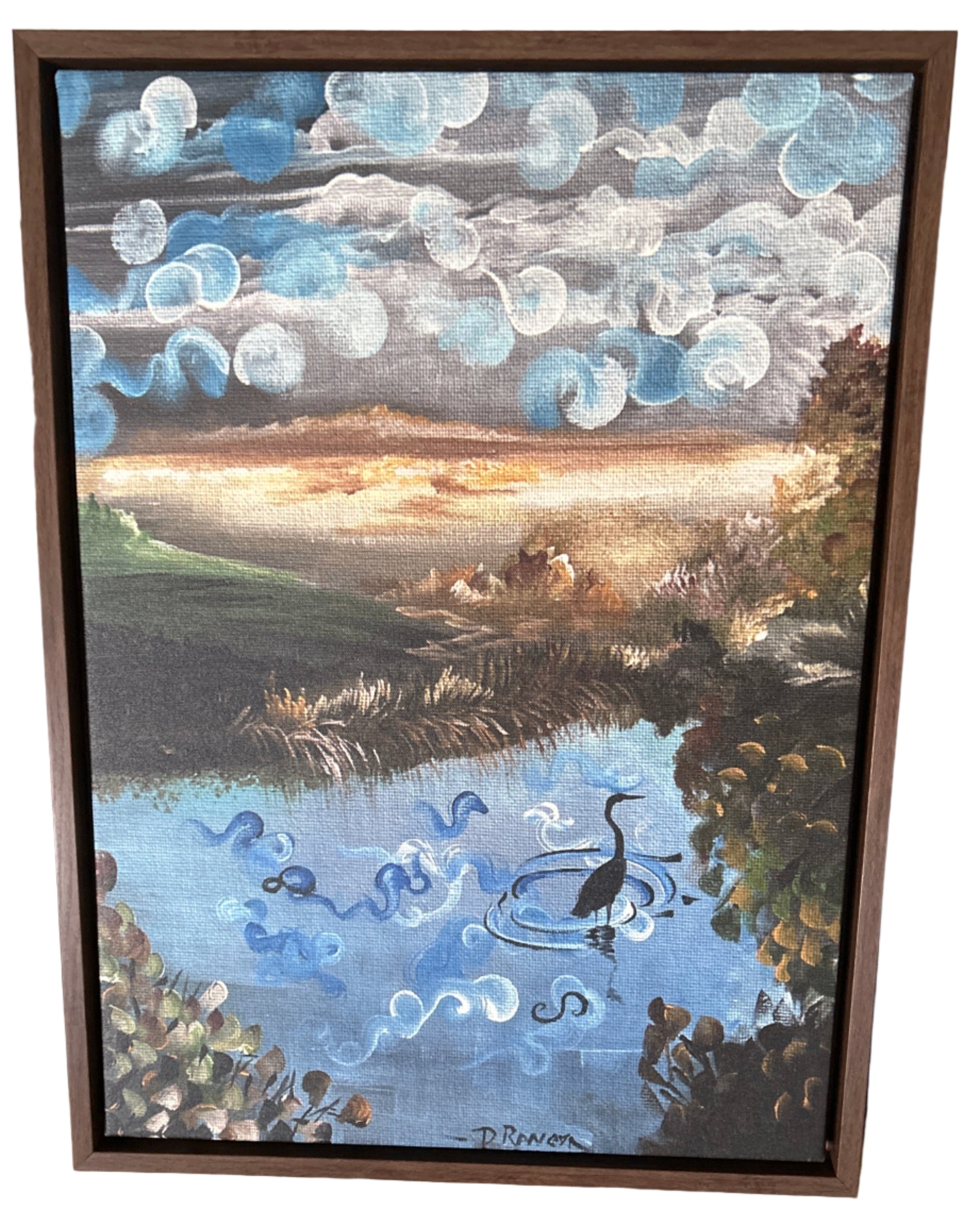 A framed painting depicting a serene landscape with swirling clouds, a reflective pond, and a solitary bird, resting on a mustard-colored couch.