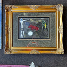 Full view of the framed artwork "Derriere Le Miroir" by Marc Chagall, c. 1950, with dimensions 39.5" x 32", showcasing the ornate golden frame and the colorful depiction of the scene.