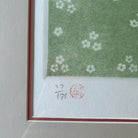 Close-up of "Time" by Eng Tay showing edition number and artist's seal.