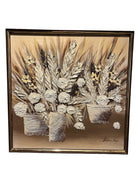 A textured painting featuring three pots of stylized flowers and leaves, rendered in shades of beige, cream, and gold with a metallic frame.